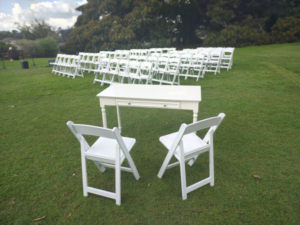 white vintage signing table with chairs outdoor set up